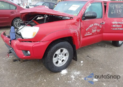 2015 Toyota Tacoma Base V6 z USA, uszkodzony, nr VIN 3TMLU4EN8FM186387